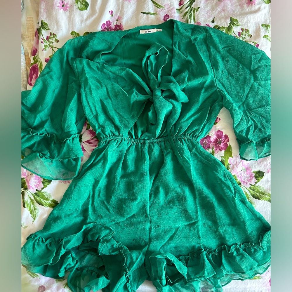 Vibrant Green Flowing Romper.